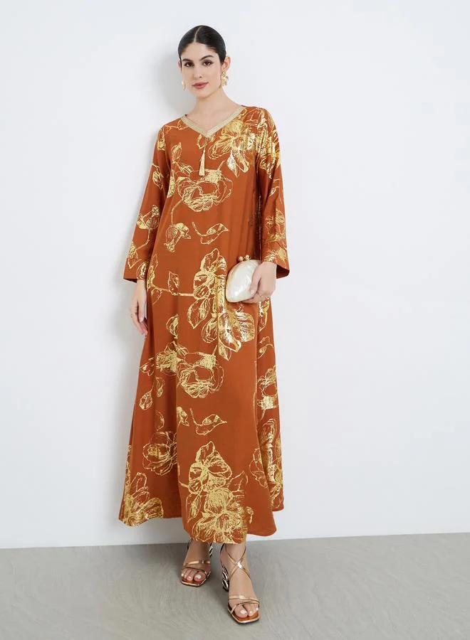 أميرة جلابية بتفاصيل شرابات وطبعة زهور